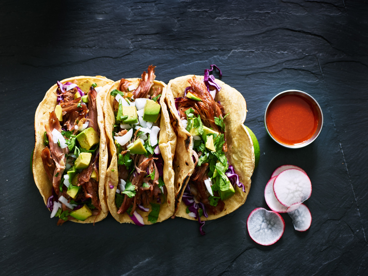 Three street tacos with wholesale Mexican ingredients in El Paso.