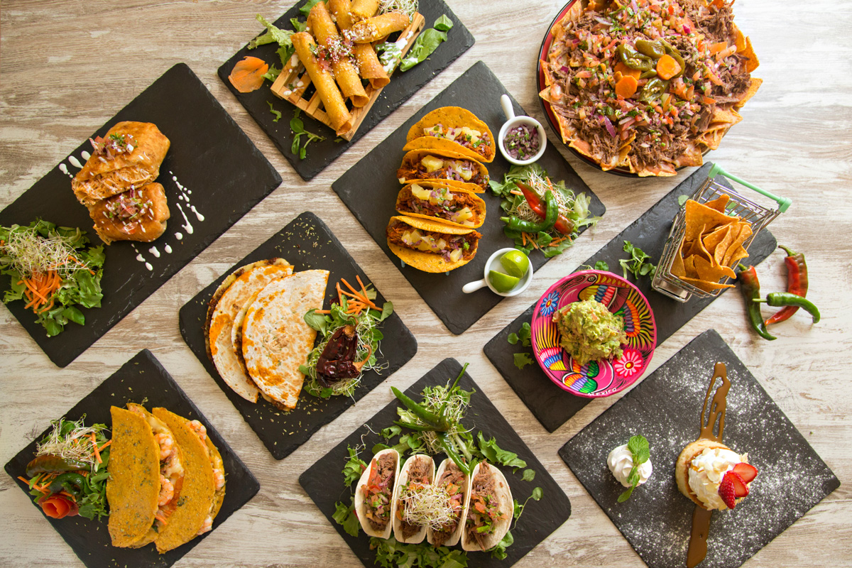 An above view of different plates of Mexican food products in El Paso.